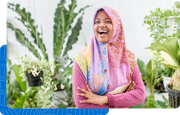 Smiling owner of a plant shop
