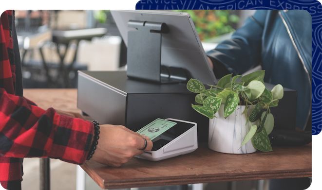 A customer using his American Express Card at checkout